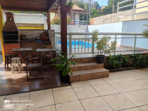 CASA COM EXCELENTE ESPACO PARA TEMPORADA